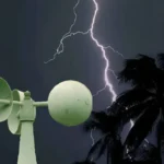 Lightning strikes near a warning siren.